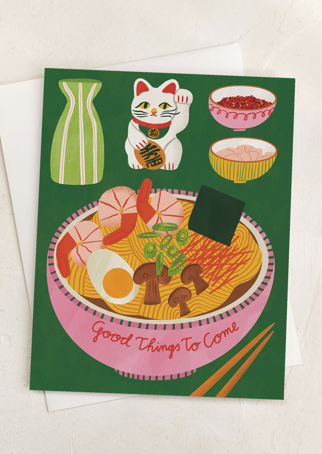 A card with image of ramen and lucky cat, text reads "Good things to come".