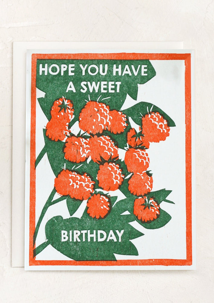 A raspberry print card reading "Hope you have a sweet birthday".