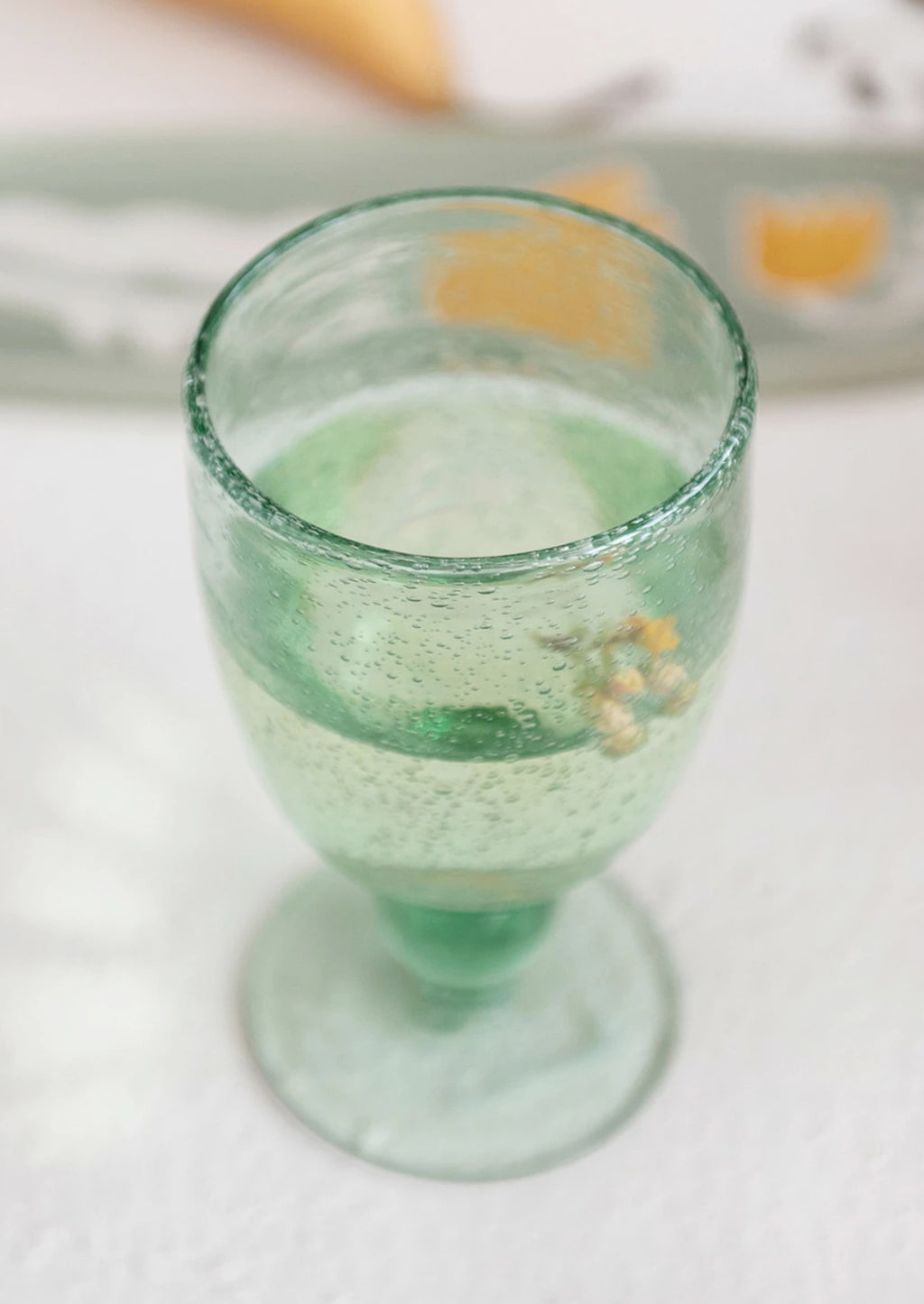 2: A wine glass made of recycled glass.