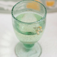 2: A wine glass made of recycled glass.