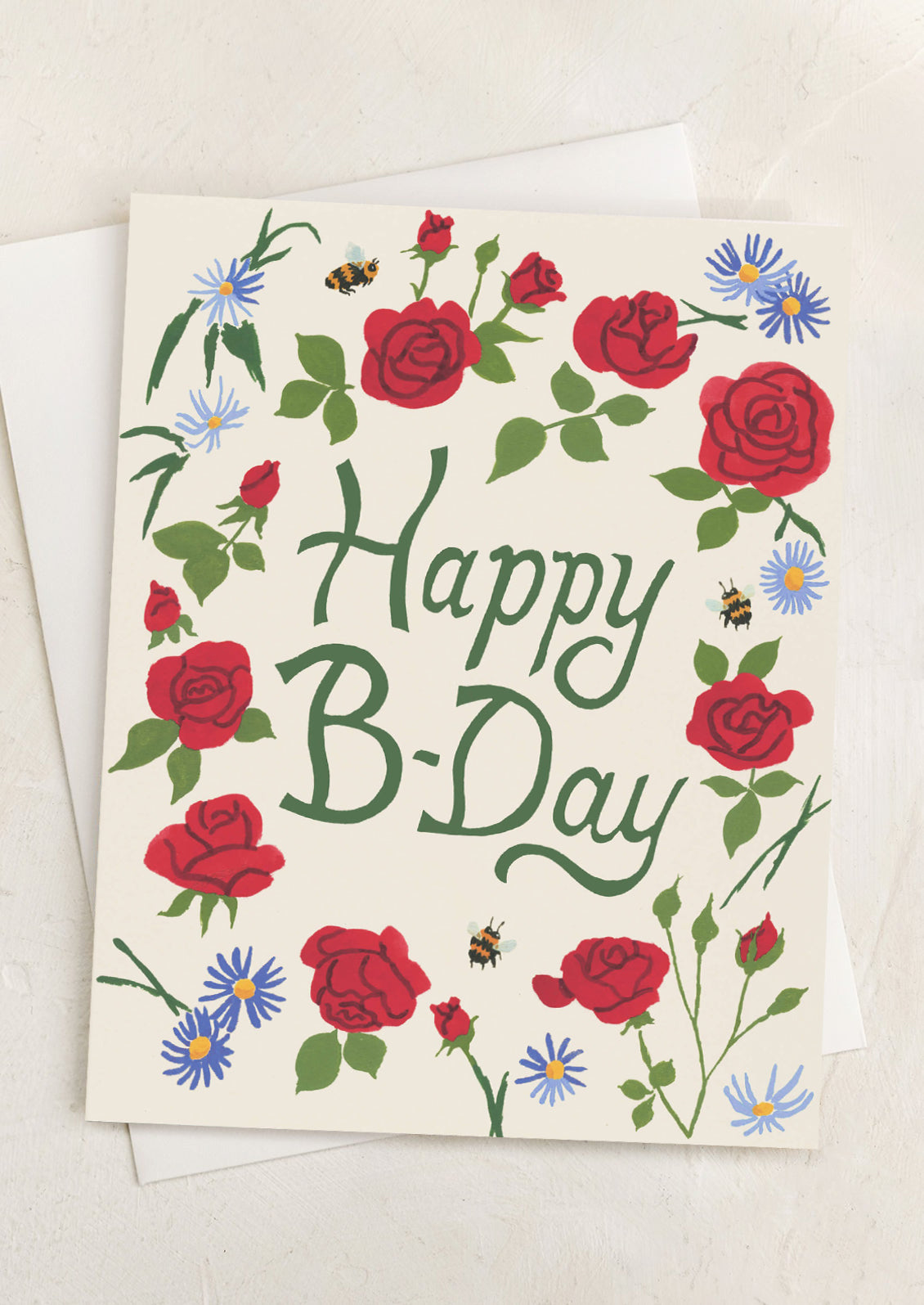 A greeting card with illustration of roses and bees, text reads "Happy Bday".
