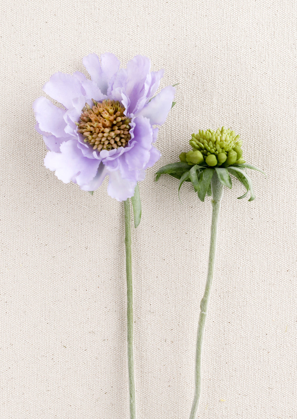 Lavender: A faux scabiosa flower in lavender.