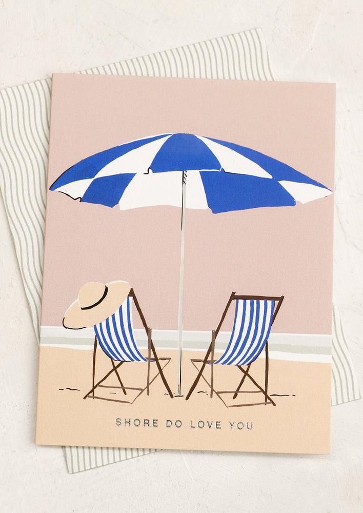 A card with picture of beach chairs, text reads "Shore do love you".