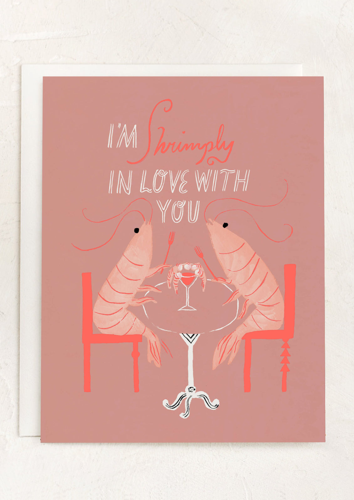 A card with illustration of two shrimp at dining table, text reads "I'm Shrimply In Love With You".