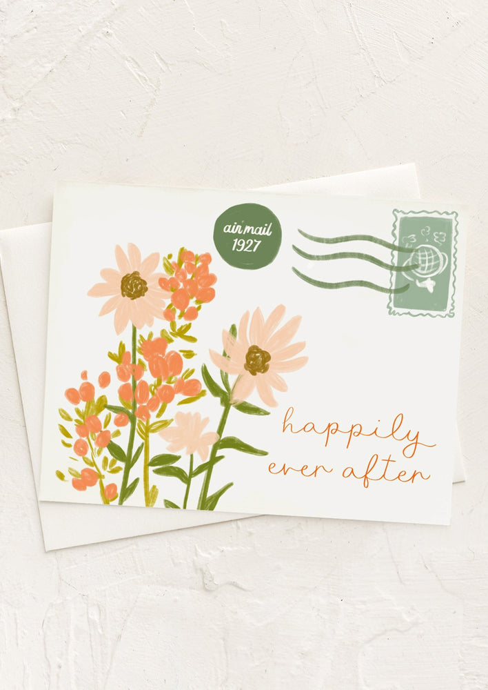 1: A card made to look like it was sent through the mail, text reads "Happily ever after".
