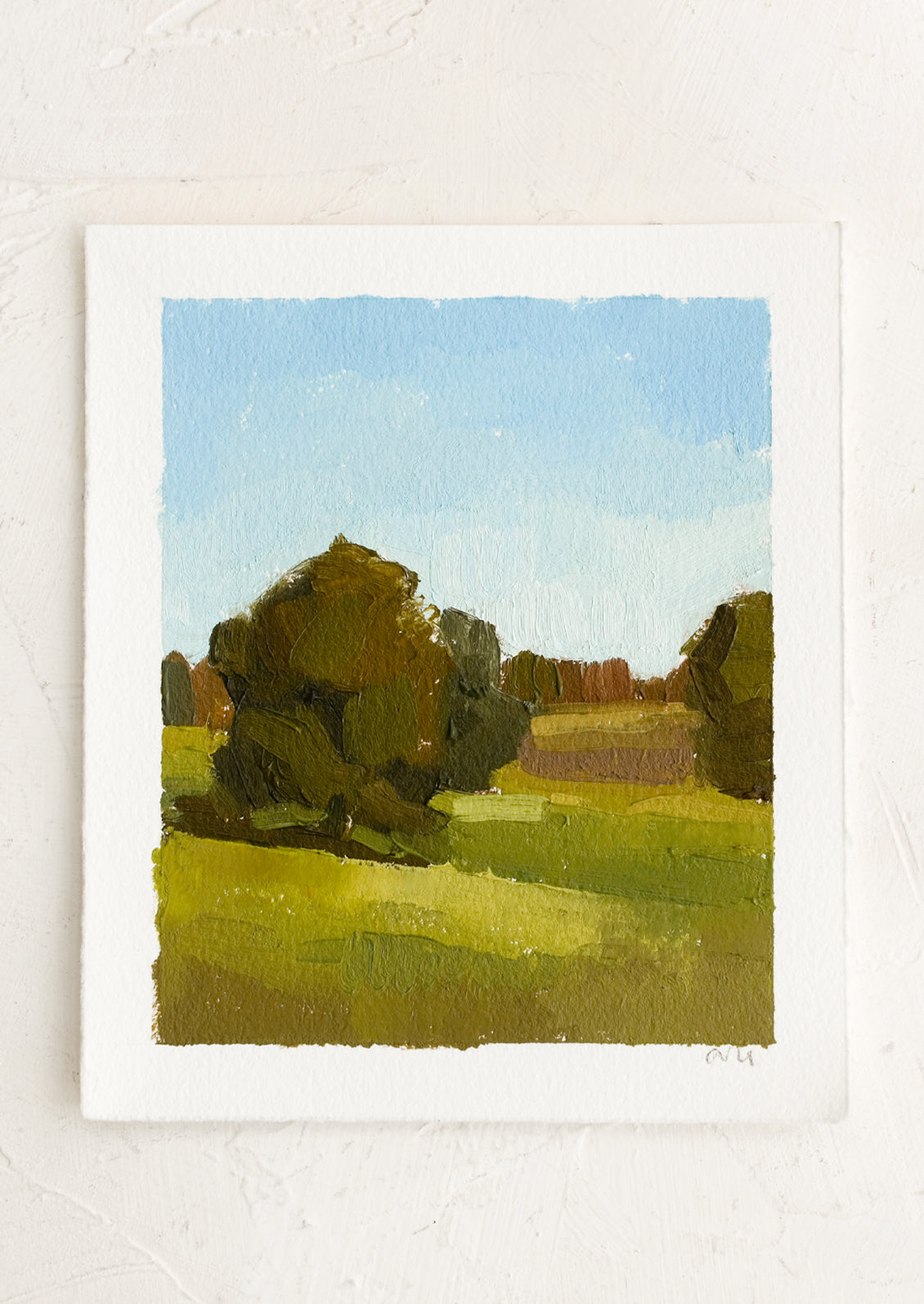 An original oil painting of a landscape on paper.