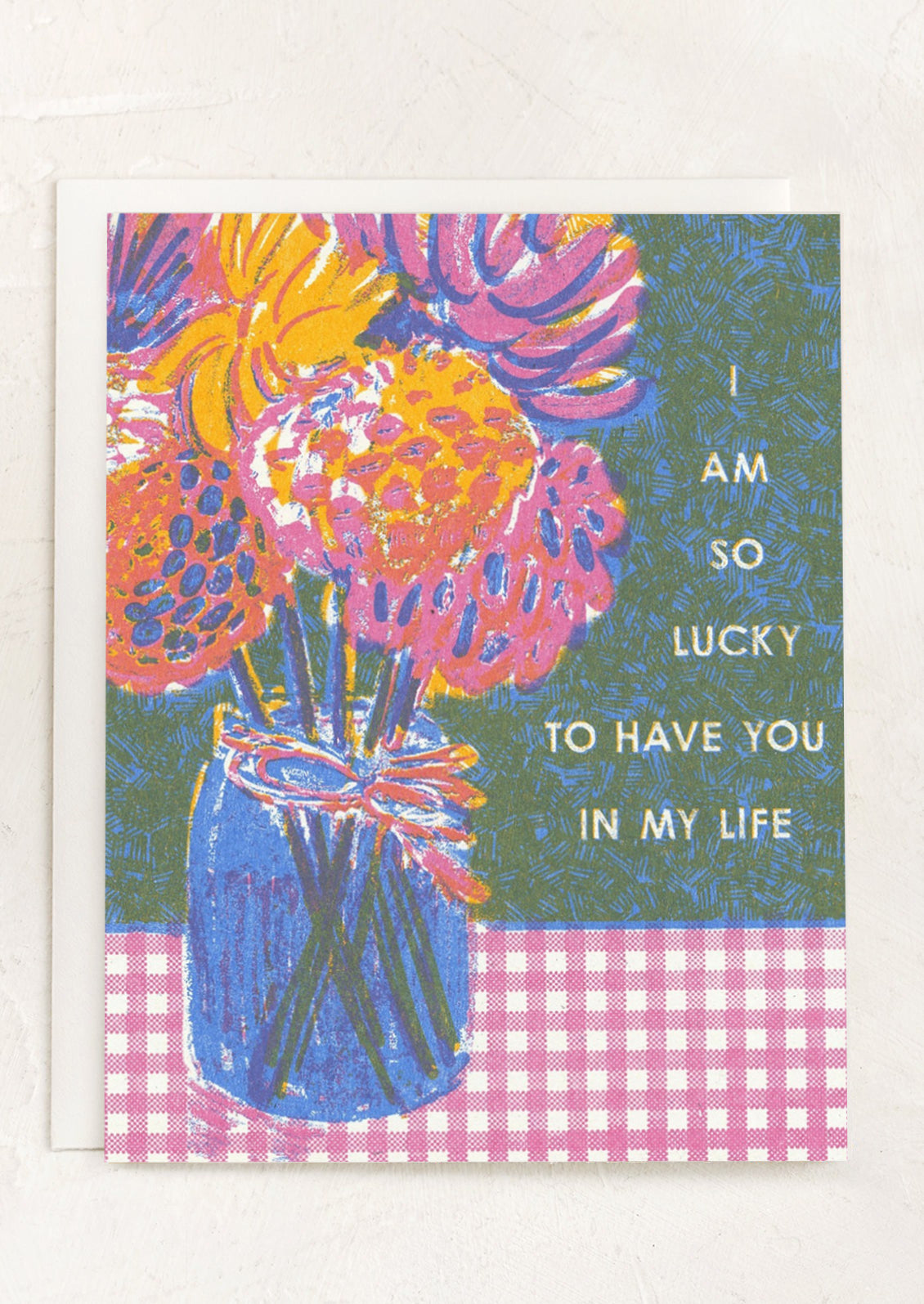 A card with image of flowers in a mason jar, text reads "I am so lucky to have you in my life".