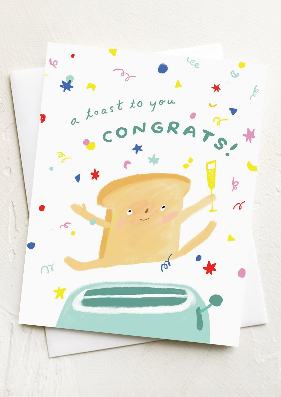 A card with illustration of an anthropomorphic piece of toast, text reads "A Toast to you, Congrats!".