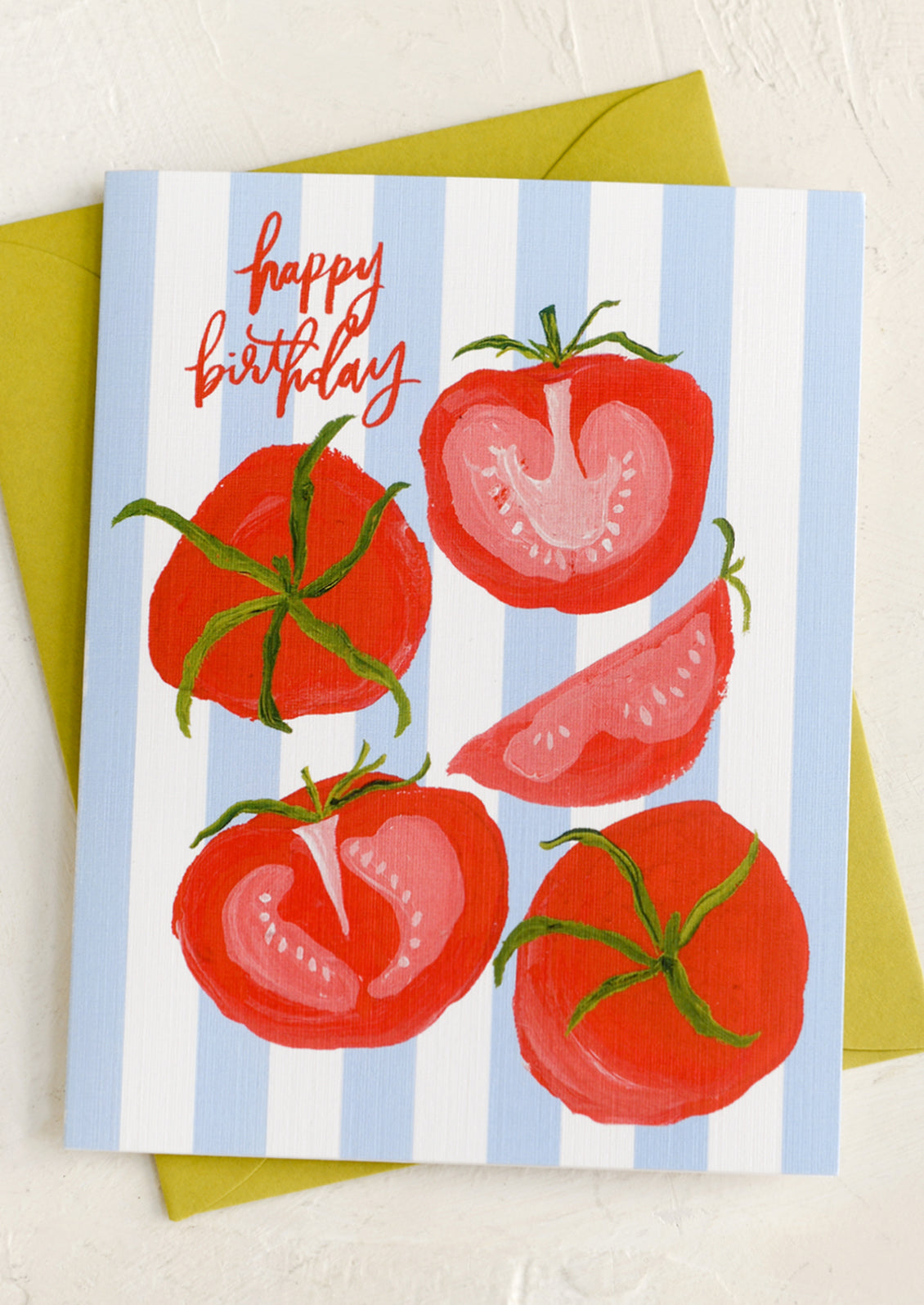 A stripe and tomato print card, text reads "happy birthday".