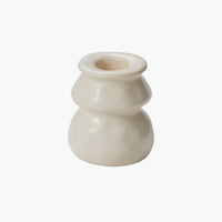 Short: Satin finish ceramic candleholders in white.