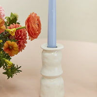 4: Satin finish ceramic candleholders in white.