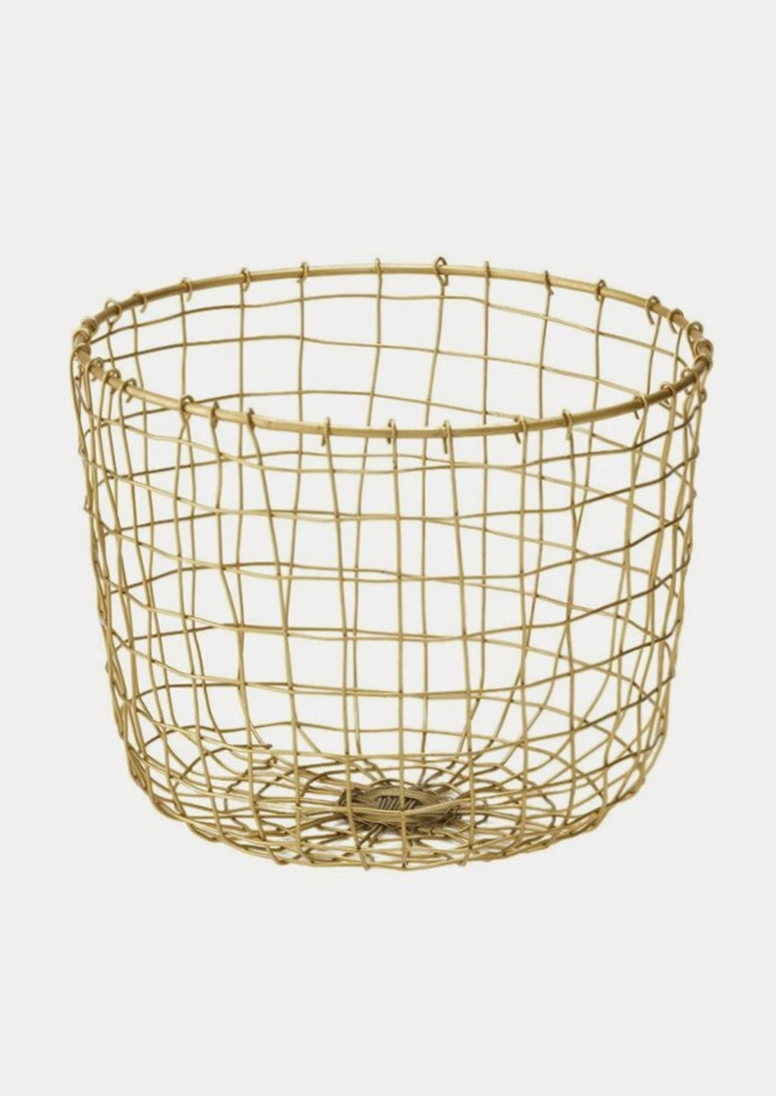 A round brass wire storage basket.