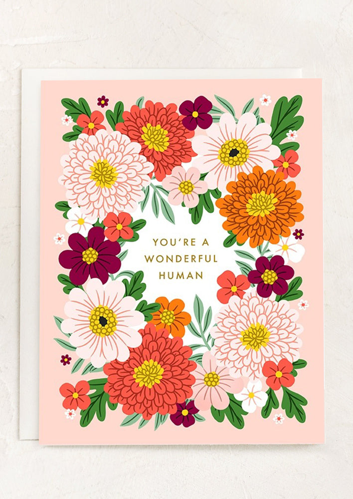 A floral print card reading "You're a wonderful human".
