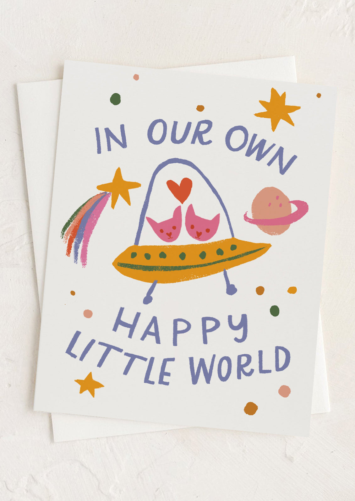 A greeting card with illustration of UFO and love text.