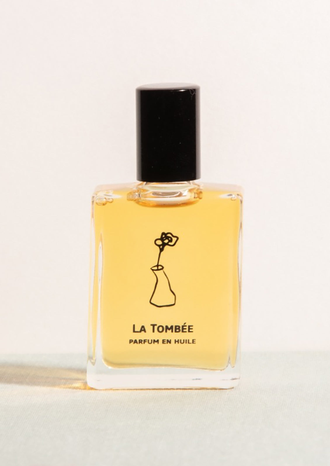 A roller bottle perfume oil in Ylang scent.