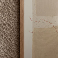 3: Art print of layered beige fabric.