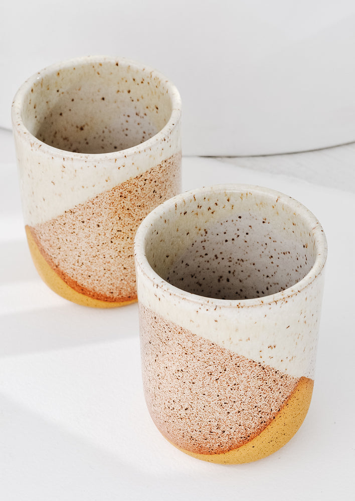 1: two speckle glazed ceramic tumblers