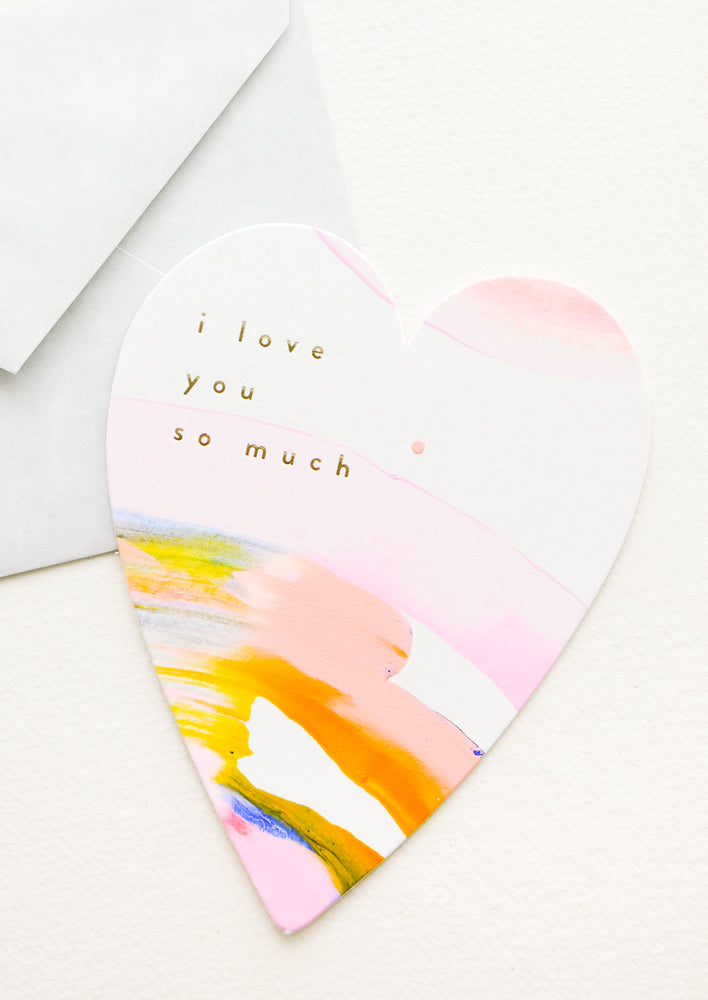 1: Heart-shaped greeting card with hand-painted multicolor swirl and gold text reading "I Love You So Much"