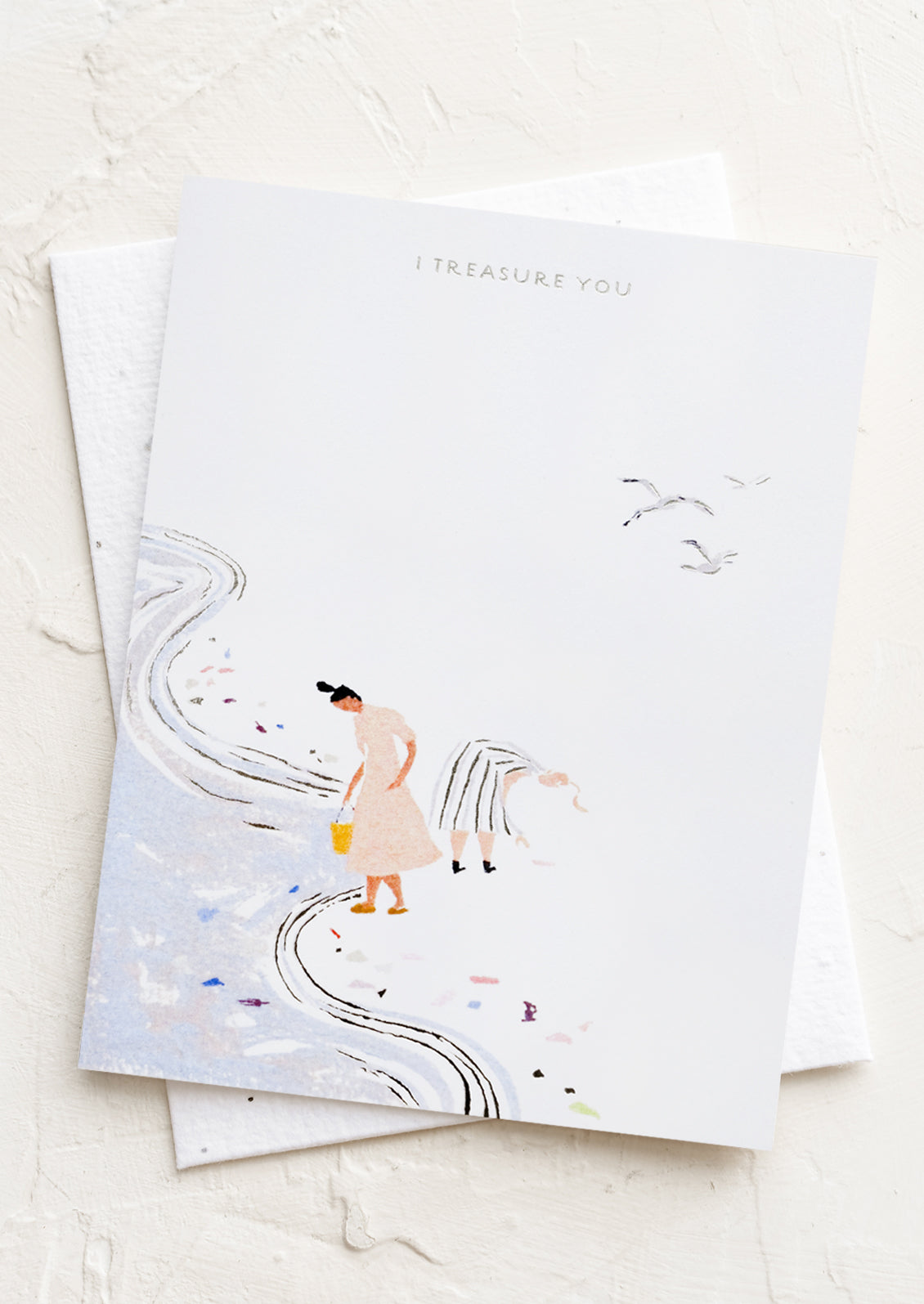 A card with illustration of women gathering shells on a beach, text reads "I treasure you".