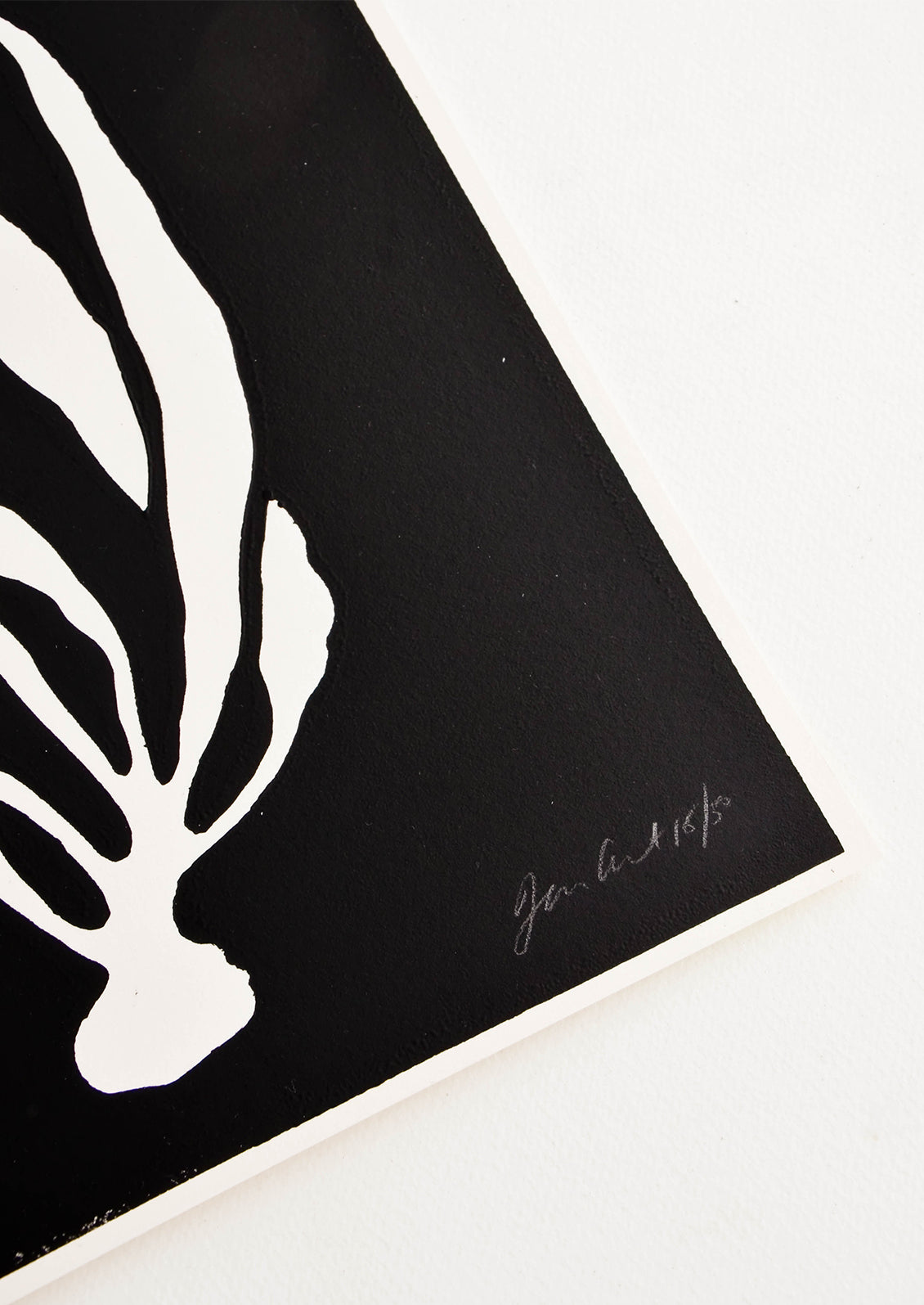 Artist's signature on handprinted artwork