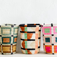 4: Pencil cup shaped baskets woven from multicolor sweetgrass.