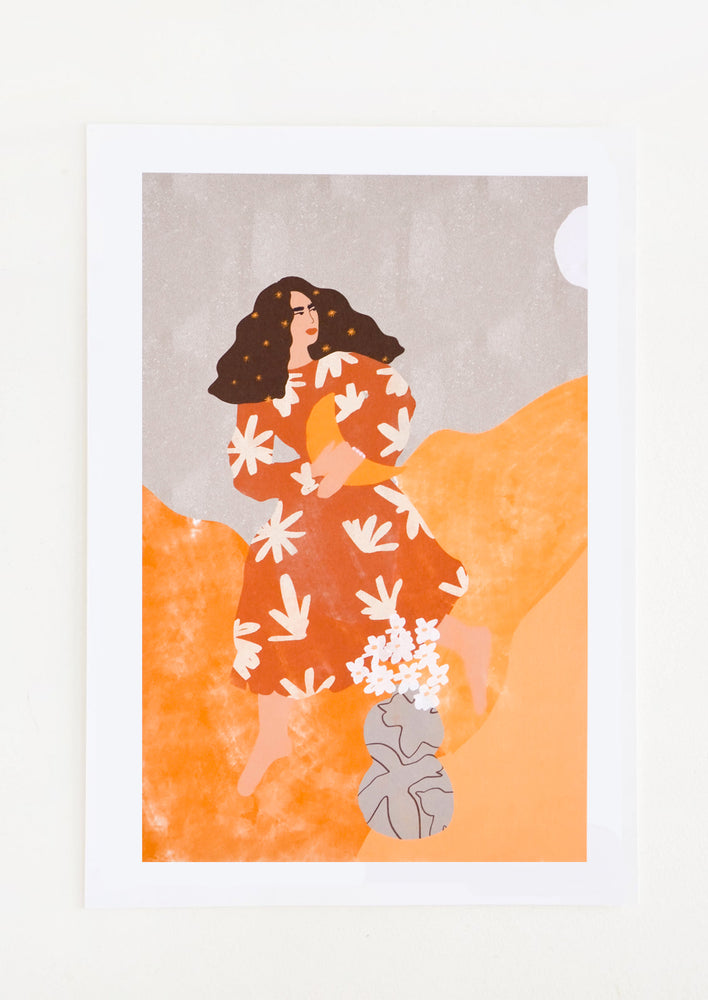 1: A long brown-haired woman in a rust colored floral dress holds a crescent moon in her arms as she moves through an orange and gray world.
