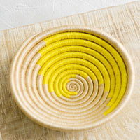 Tan / Sun Yellow: A sweetgrass catchall bowl in tan and sun yellow.
