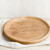 1: A round hardwood platter.