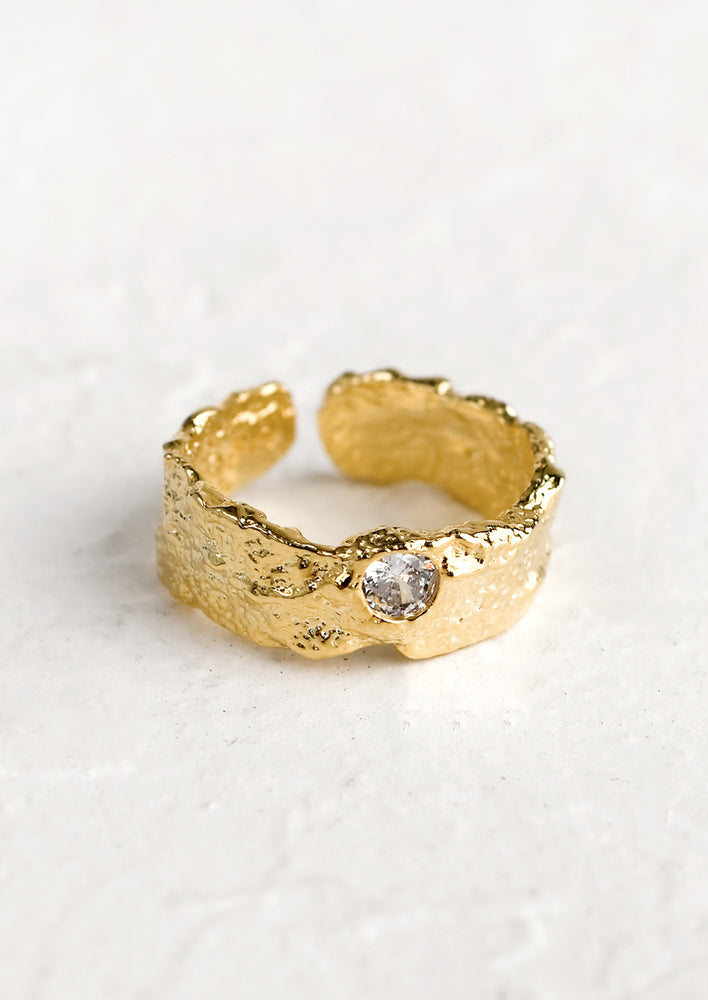 1: A chunky organically textured ring with single crystal detail.