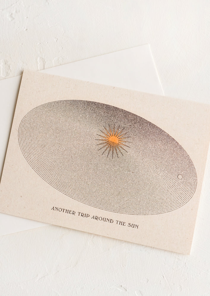 1: A birthday card with orbiting universe image and text reading "Another trip around the sun".