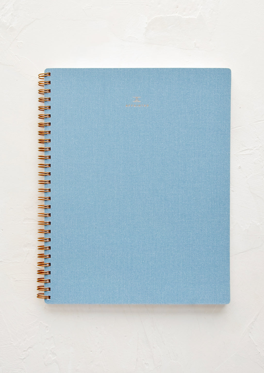 Chambray: A spiral bound notebook in blue.