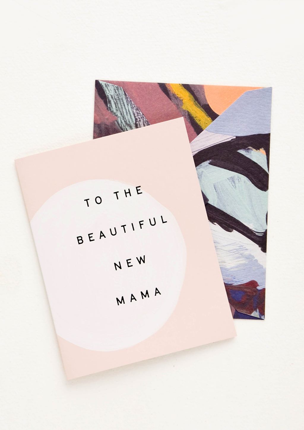 1: Greeting card with hand painted circle and black text reading "To The Beautiful New Mama", paired with abstract printed envelope