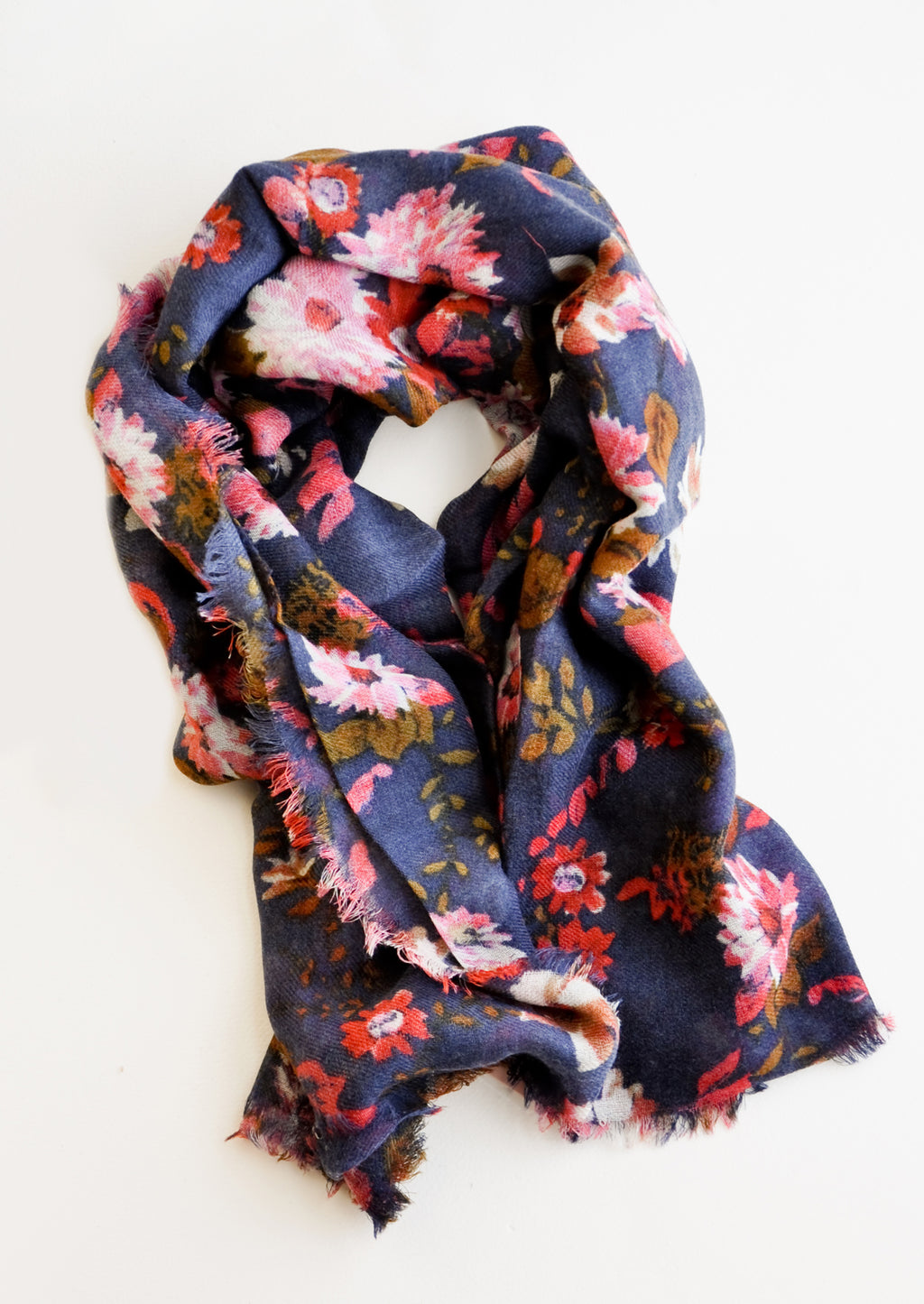 Midnight Blue: Wool-cashmere scarf with dark blue background and multi-colored pink and red floral pattern 