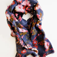 Midnight Blue: Wool-cashmere scarf with dark blue background and multi-colored pink and red floral pattern 