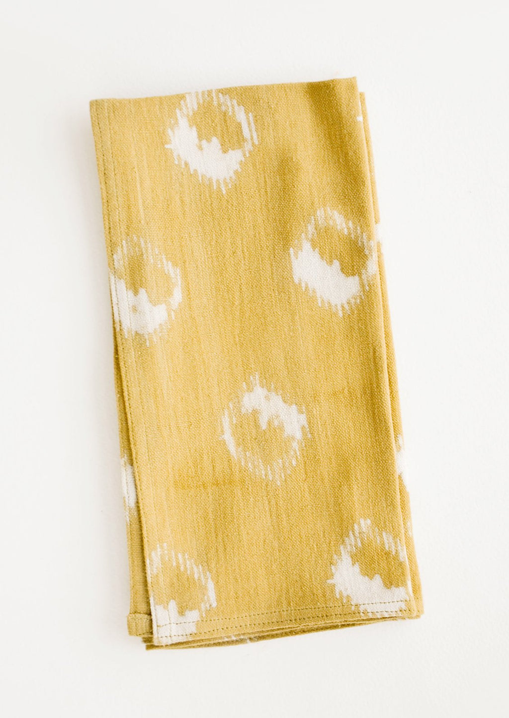 Mustard: Block print cotton dinner napkin in mustard yellow with ikat print