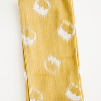 Mustard: Block print cotton dinner napkin in mustard yellow with ikat print