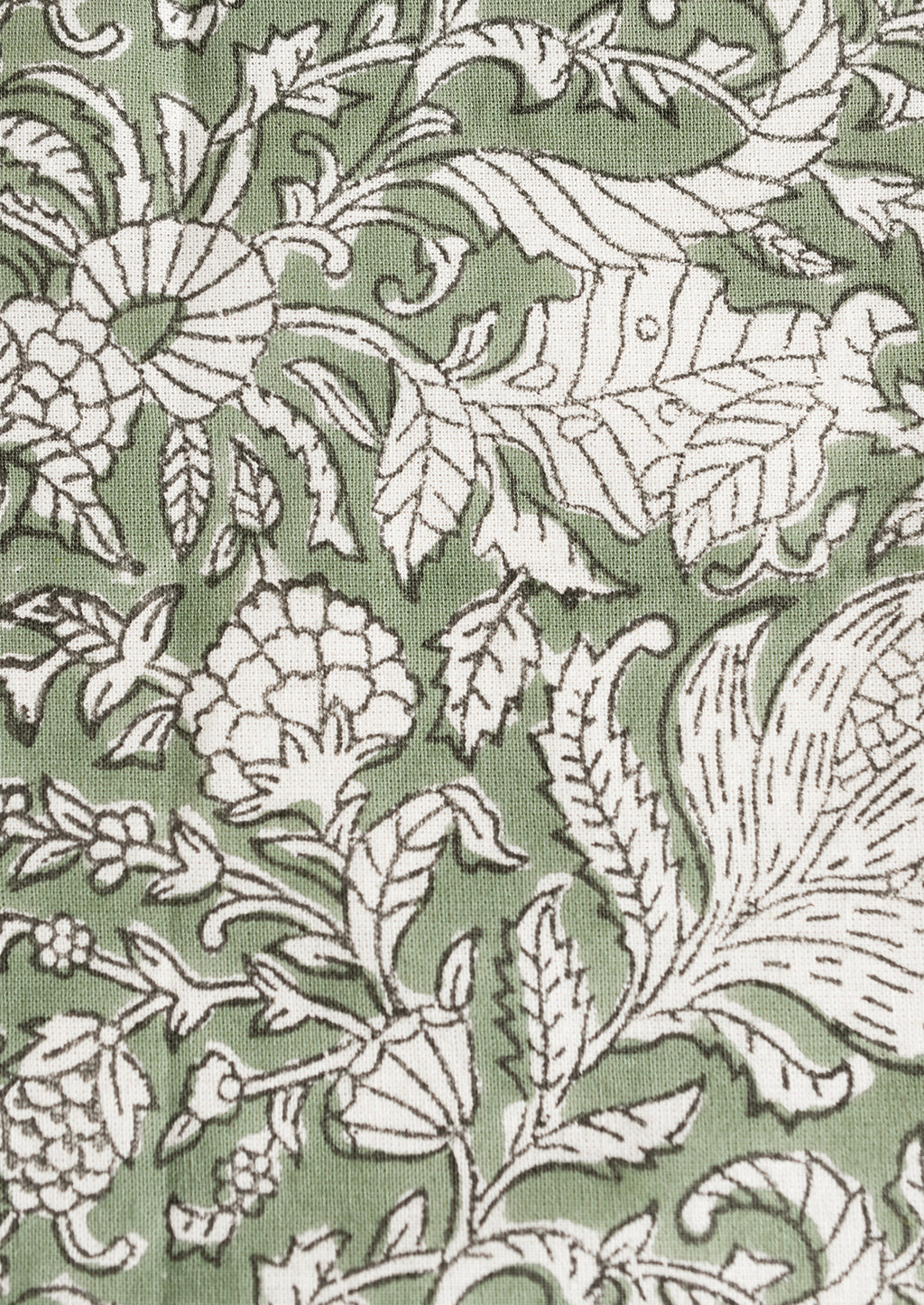 3: A pair of block print napkins in ivy green with black and white floral print.
