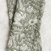 Spring Ivy Multi: A pair of block print napkins in ivy green with black and white floral print.