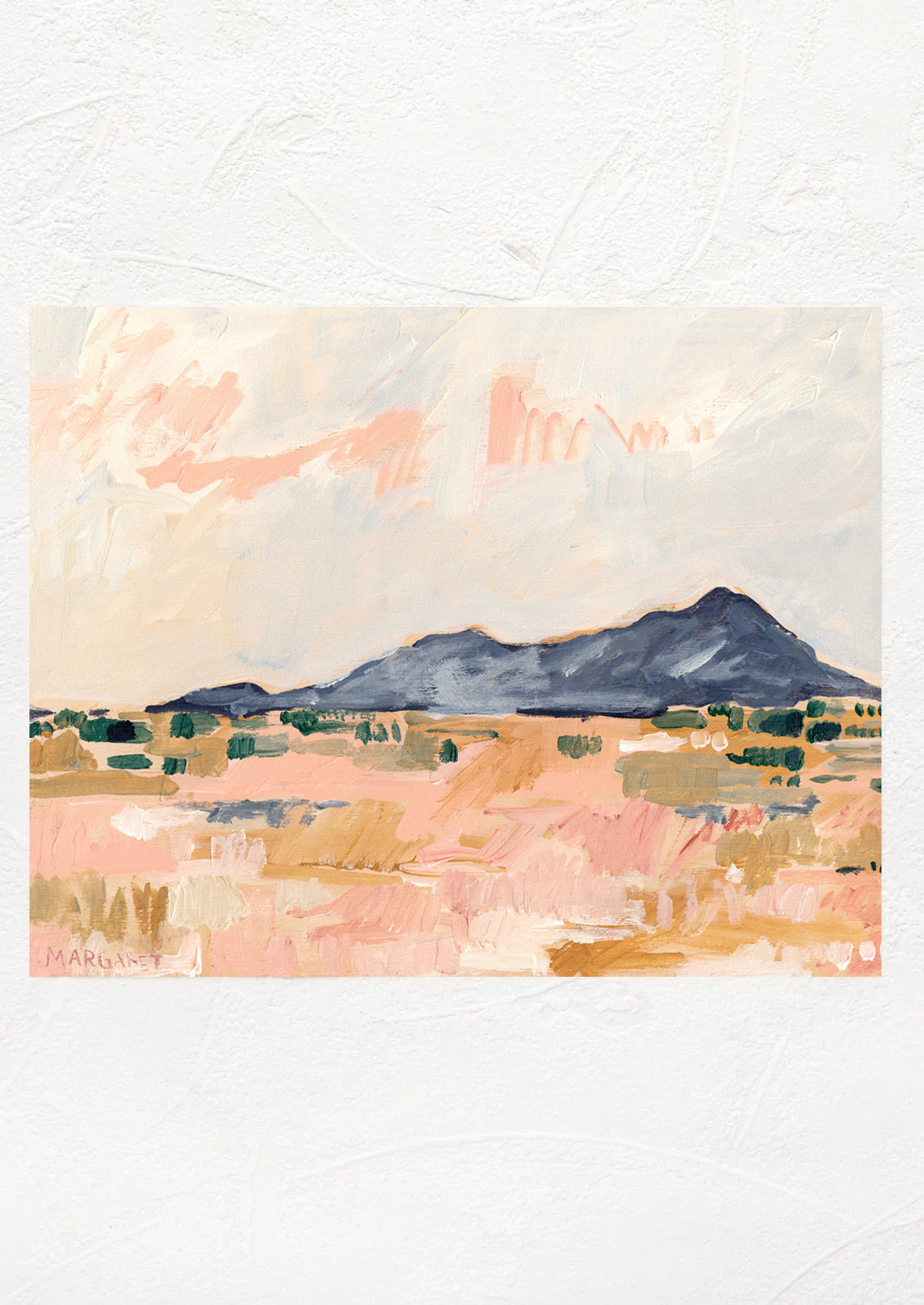 A print of a pastel hued desert landscape painting.