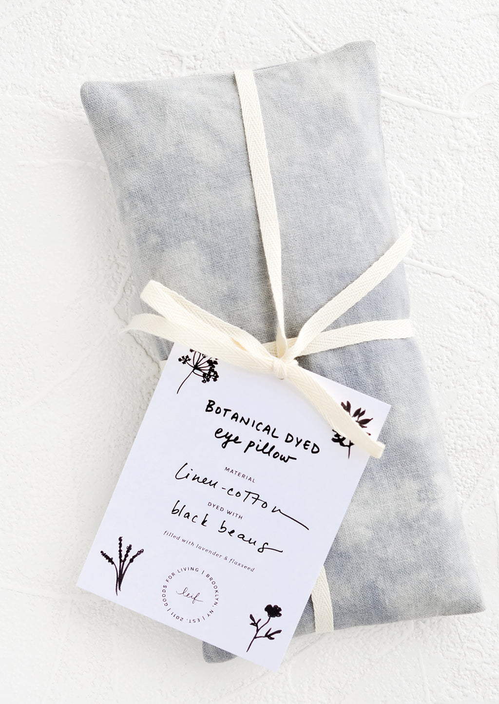 Black Bean: A naturally dyed relaxation eye pillow in blue-grey color dyed using black beans.