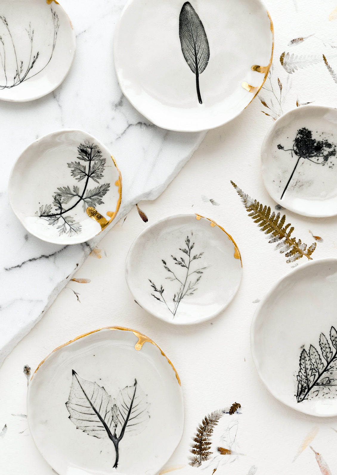 Assortment of delicate black and white ring dishes.