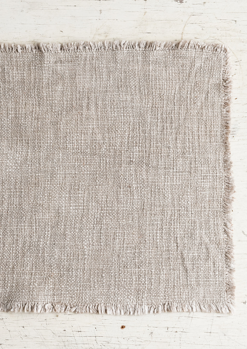 Taupe: A slub boucle textured placemat in taupe.