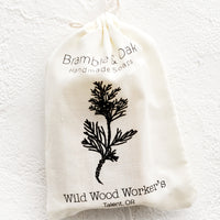 Wild Wood Worker's: A printed muslin bag with botanical imagery.