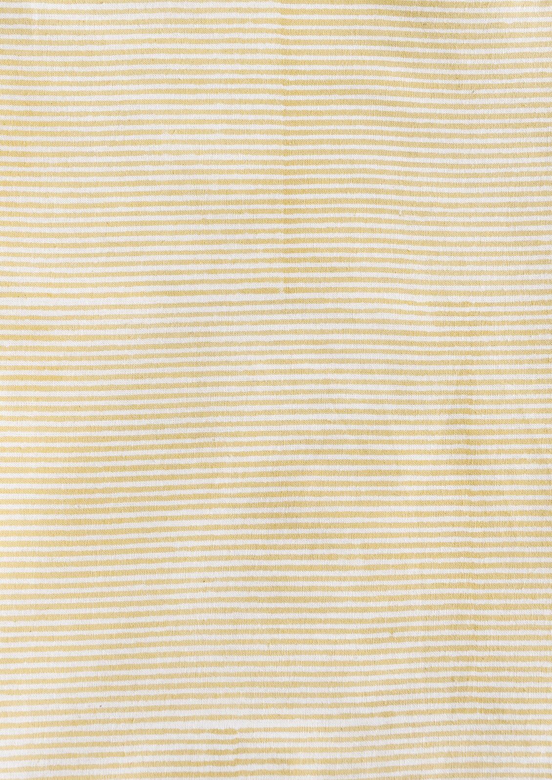 A stripe pattern tablecloth in maize.