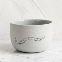 Small / Millipede / Grey: A short and wide grey porcelain cup with millipede sketch.