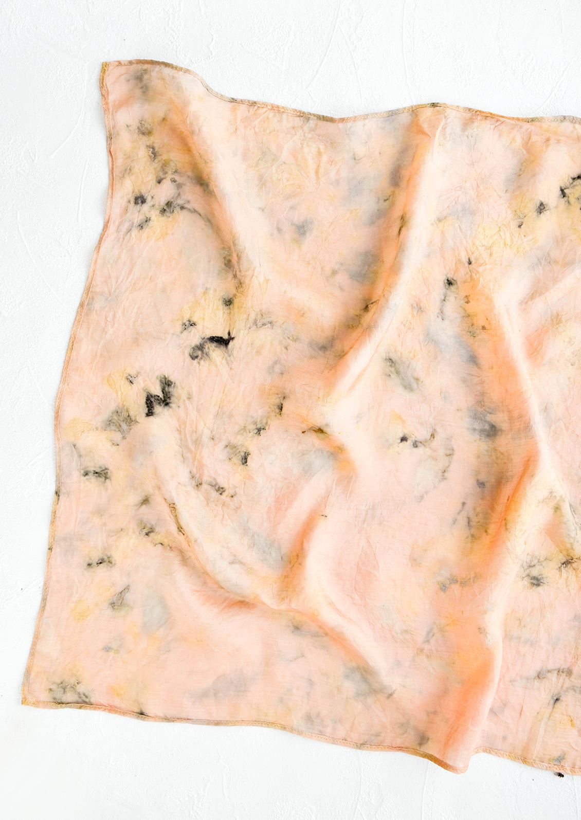 Botanically dyed, one of a kind silk scarf with randomized splatters of color. Peach with black and yellow.