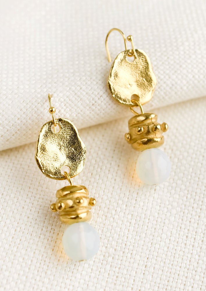 1: A pair of earrings in old world design with moonstone bead.
