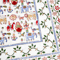 3: Block printed, folk carnival print in blue, green and red on white cotton.