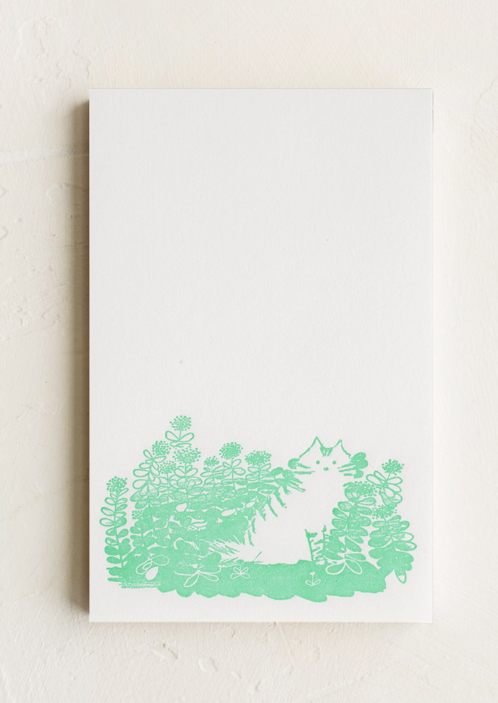 Fluffy Cat: A letterpress printed notepad with cat design at bottom.
