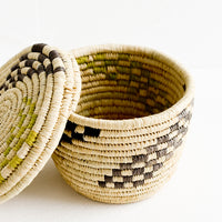 3: Small raffia baskets in woven checker print.